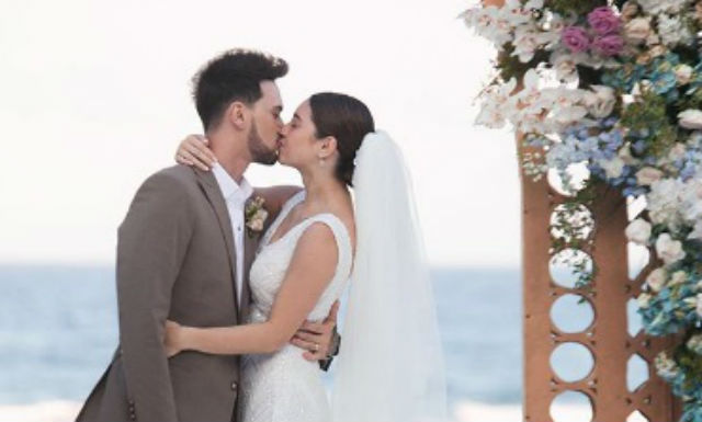 CONGRATULATIONS. Billy Crawford and Coleen Garcia kiss after the ceremony in Balesin Island. Screenshot from Instagram/@mymetrophoto 