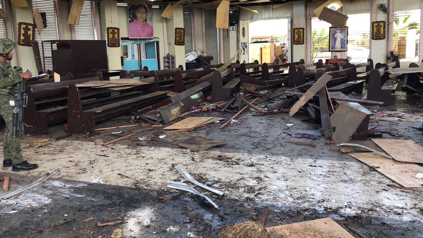 AFTERMATH. Two bombs are detonated at the Jolo Cathedral in Sulu on January 27, 2019, killing civilians hearing Mass and security forces who later rushed to rescue survivors. Photo from AFP Westmincom 