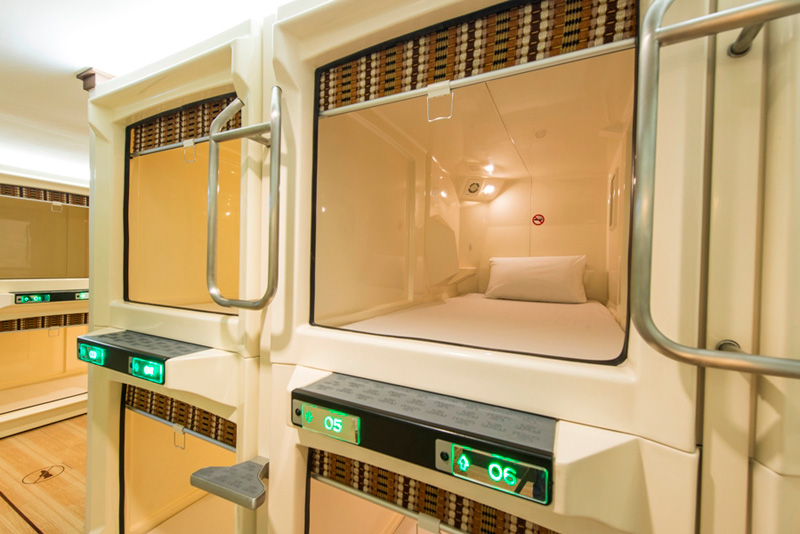 YOUR OWN CAPSULE. At the moment, Kabayan Hotel in Pasay offers capsule beds for P850 per night. Aside from a bed, capsules have a light, a socket, exhaust fan, a mirror, and a small space for belongings. There are lockers and towel racks outside. Photo courtesy of Kabayan Hotel