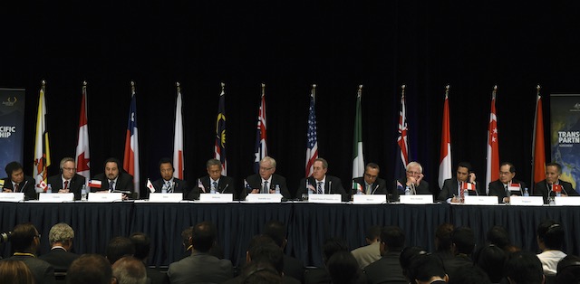 In this file photo, trade ministers and heads of delegation for the Trans-Pacific Partnership Agreement negotiations, attend a media briefing in Sydney, Australia, October 27, 2014. Dan Himbrechts/EPA