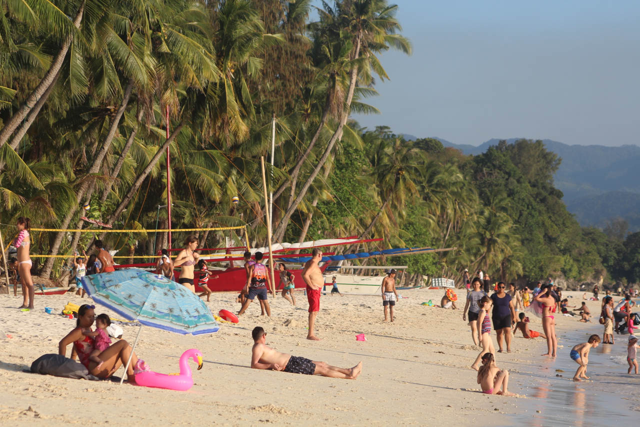 AFFECTED. Tourists along Boracay Island's shores during Holy Week 2019. Photo by Boy Ryan B. Zabal 