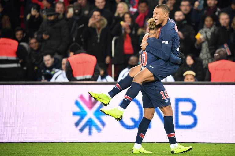 HOTSHOTS. Paris Saint-Germain's teen star Kylian Mbappe (right) celebrates with teammate Neymar after scoring a goal against Lille. Photo by Franck Fife/AFP 