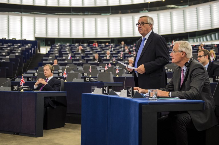 FLOOR DEBATE. European Commission President Jean-Claude Juncker (C) delivers a speech as European Chief Negotiator for Brexit Michel Barnier (R) and former leader of the UK Independence Party (UKIP) Nigel Farage (L) listen during a debate on the progress of the Brexit talks at the European Parliament in Strasbourg, eastern France, October 3, 2017. Patrick Hertzog/AFP 