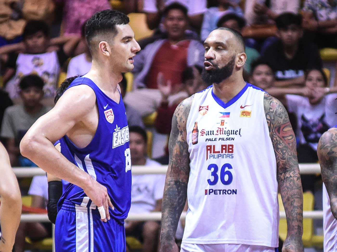 LAST LAUGH. PJ Ramos (right) steps up to protect his teammates as he claimed that Sam Deguara almost injured Renaldo Balkman. Photo by Jerrick Reymarc/Rappler   