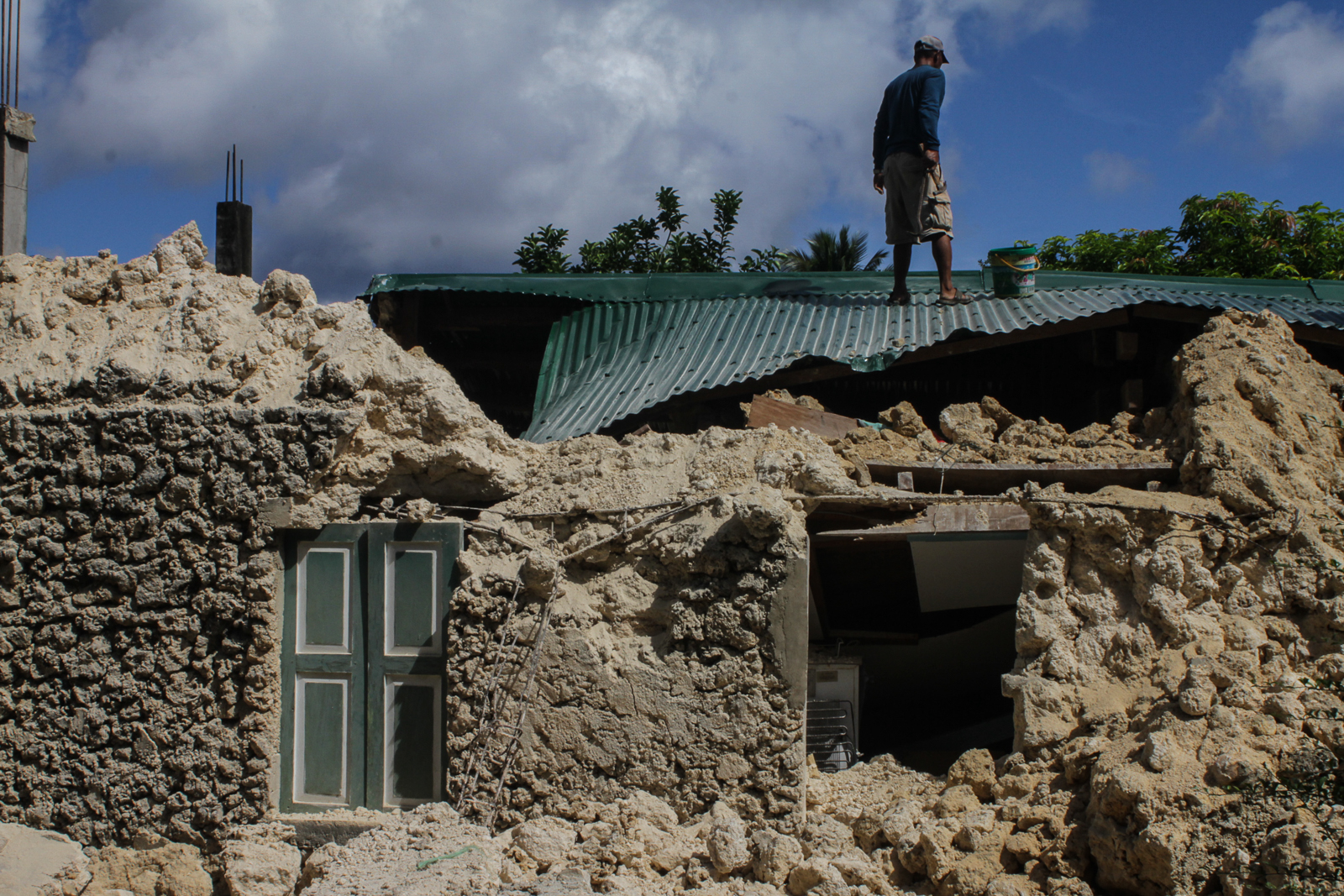 HOMES LOST. Residents demolish their houses destroyed by a series of earthquakes in Itbayat Island, Batanes on July 29, 2019. Photo by Lito Borras/Rappler 