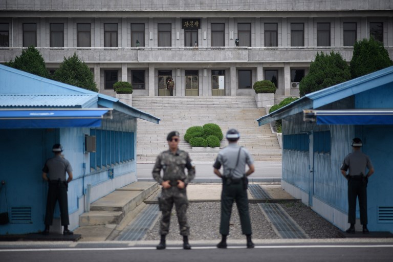 NORTH AND SOUTH. In this photo taken on August 2, 2017, South Korean soldiers stand before the North Korean side of the truce village of Panmunjeom, within the Demilitarized Zone separating North and South Korea. File photo by Ed Jones/AFP 