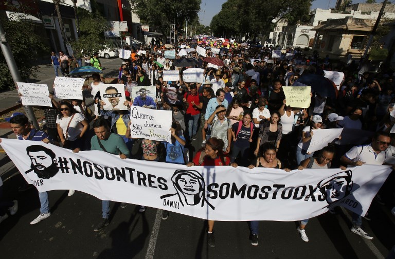 PROTEST. Mexican students take part in a massive protest against violence in Mexico and the murder of three film students who were Kidnapped, tortured and murdered in western Jalisco State last month, in Guadalajara, Jalisco, Mexico, on April 26, 2018. Photo by  Ulises Ruiz/AFP 