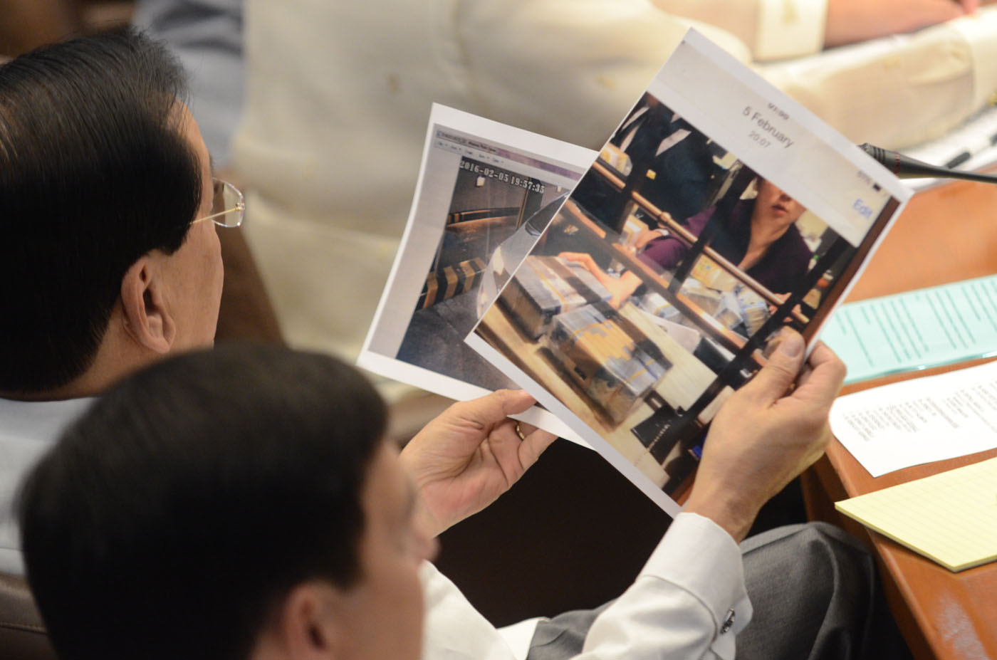 PROOF? Photos presented by Kim Wong during the March 29 Senate hearing show Deguito's car and the stack of money delivered. Photo by Alecs Ongcal/Rappler 