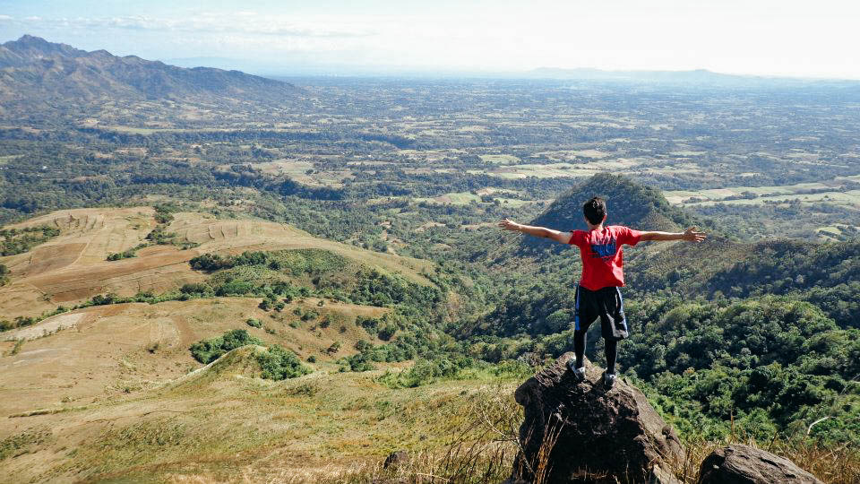 ON A HIGH. After reaching the summit, one can't help but embrace the moment. Photo by Joshua Berida 