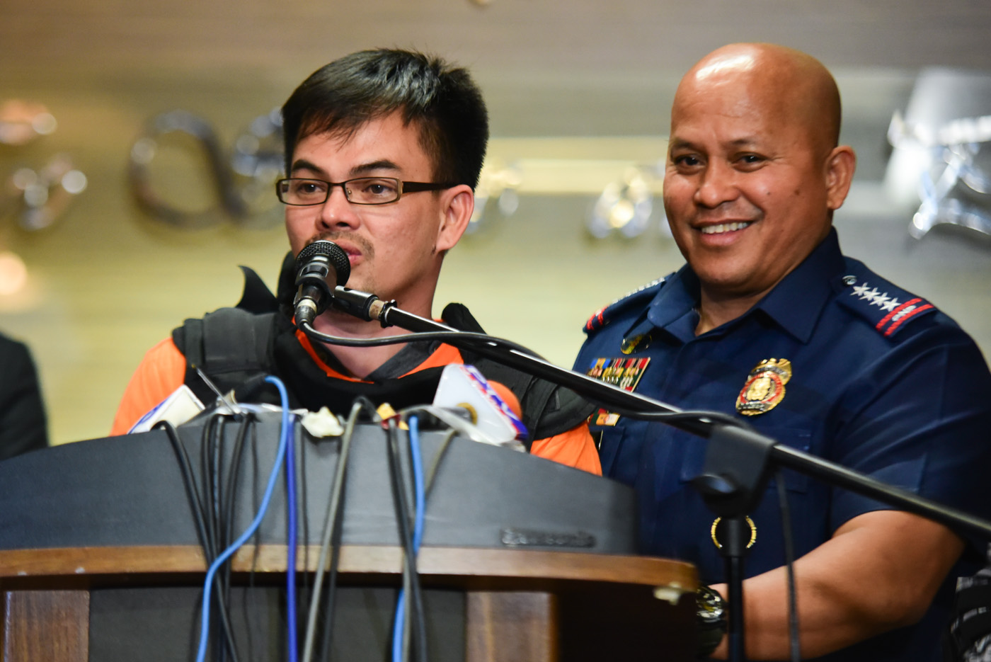MISSING PIECE? PNP chief Ronald dela Rosa presents alleged drug lord Kerwin Espinosa after he arrived in the Philippines from Abu Dhabi at Camp Crame on November 18, 2016. Photo by Alecs Ongcal/Rappler  