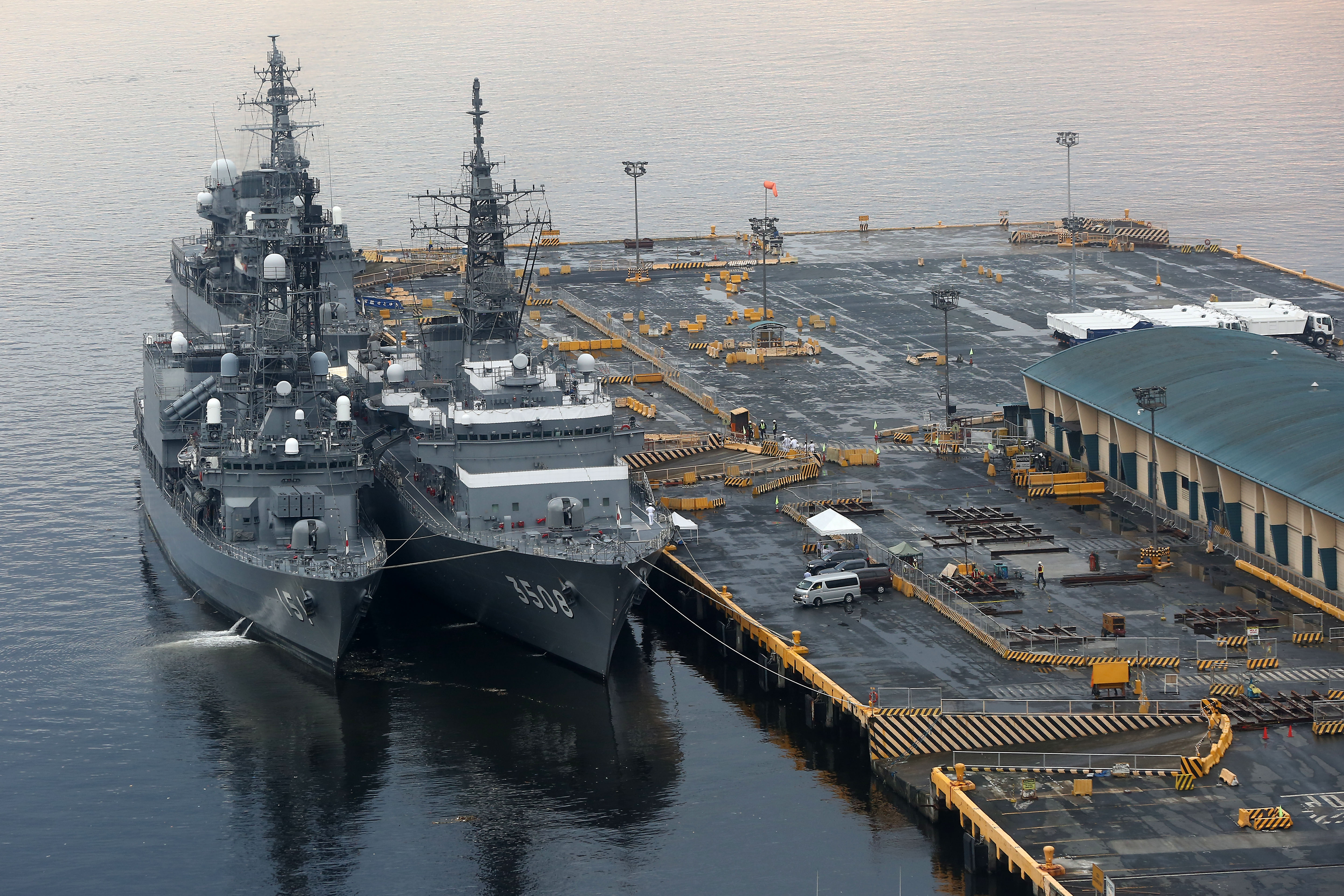 a u.s. fleet of warships led by what person forced japan to open its doors to foreign involvement?