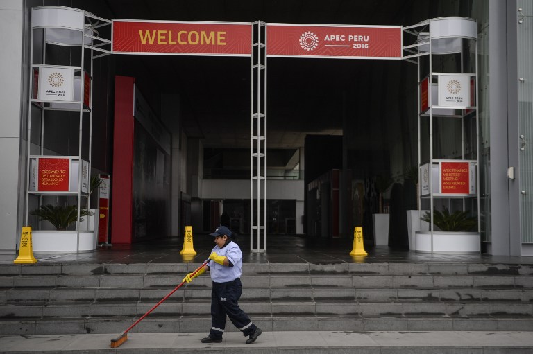 READY FOR APEC. A worker sweeps the front stairs of the convention centre prior to the upcoming APEC Finance Ministerial Meeting, in Lima, on October 12, 2016. Ernesto Benavides/AFP 