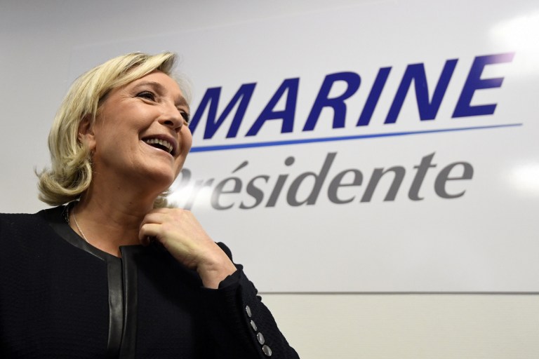 THE NEXT TRUMP? President of the French far-right party and presidential candidate for the 2017 French presidential elections Marine Le Pen smiles during the inauguration of her campaign headquarters in Paris on November 16, 2016. Alain Jocard/AFP 