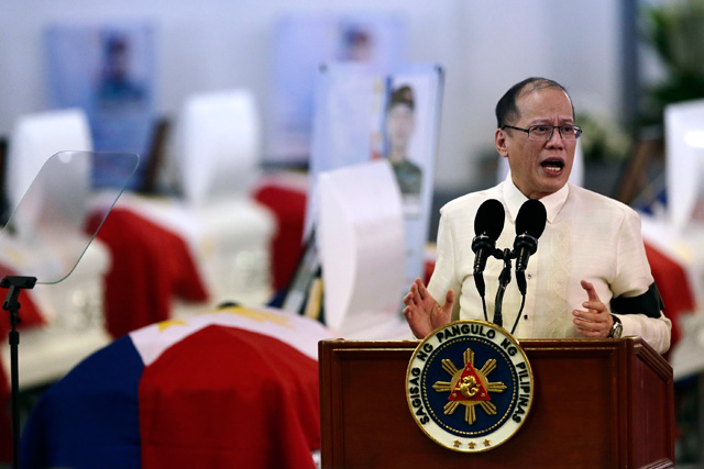 MAMASAPANO'S GHOSTS. President Benigno Aquino III delivers his speech during the necrological service for 42 slain SAF members at Camp Bagong Diwa in Taguig on January 30, 2015. File photo by Dennis Sabangan/EPA 