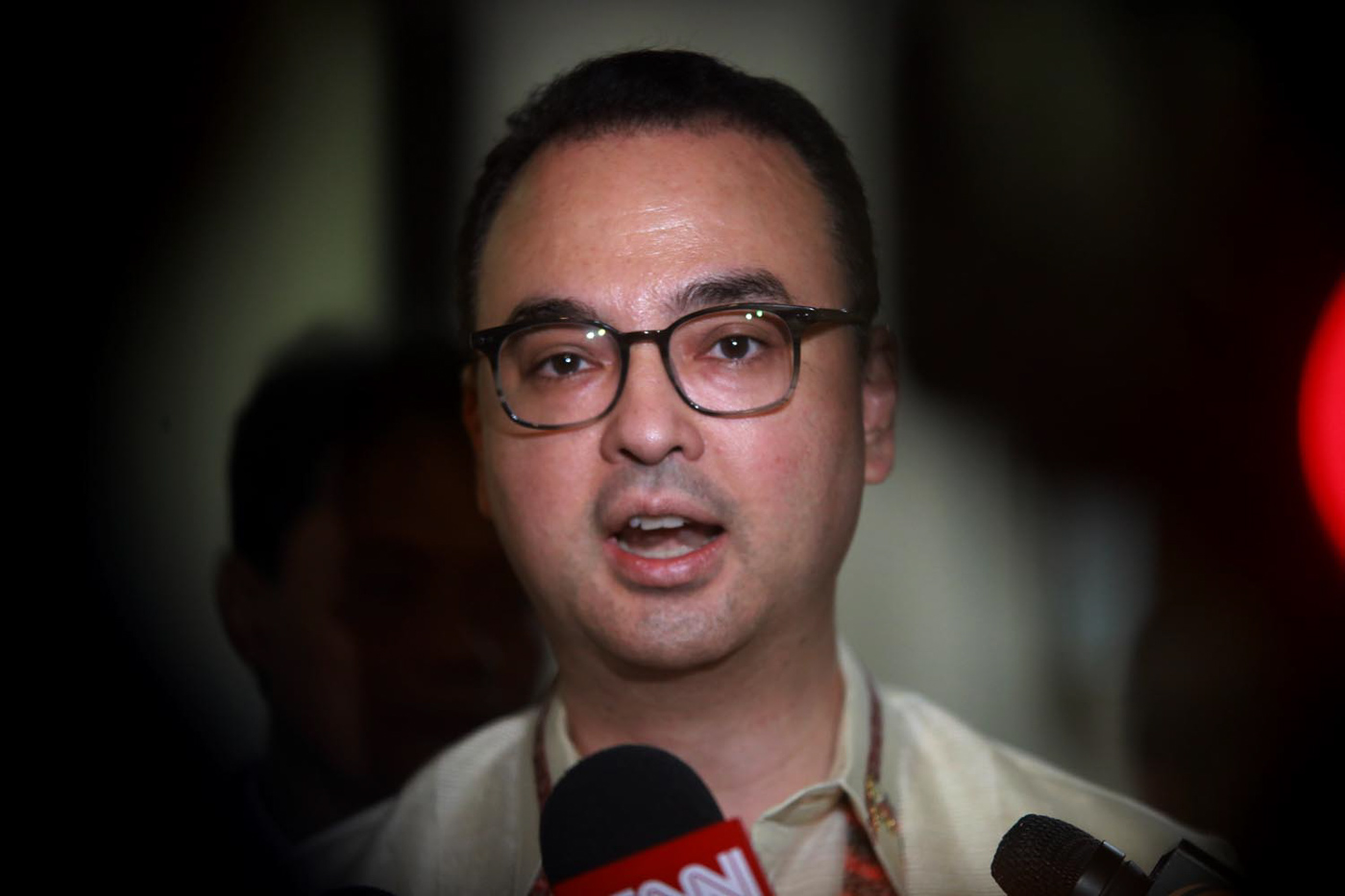 TOP DIPLOMAT. Foreign Secretary Alan Peter Cayetano addresses reporters in an ambush interview on the sidelines of a congressional hearing on the West Philippine Sea on May 30, 2018. Photo by Darren Langit/Rappler 