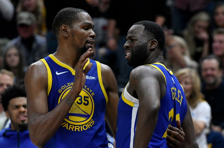 CLASH. Teammates play down the bickering between Kevin Durant and Draymond Green as ‘just team spirit.’ Photo by Gene Sweeney Jr./Getty Images/AFP   