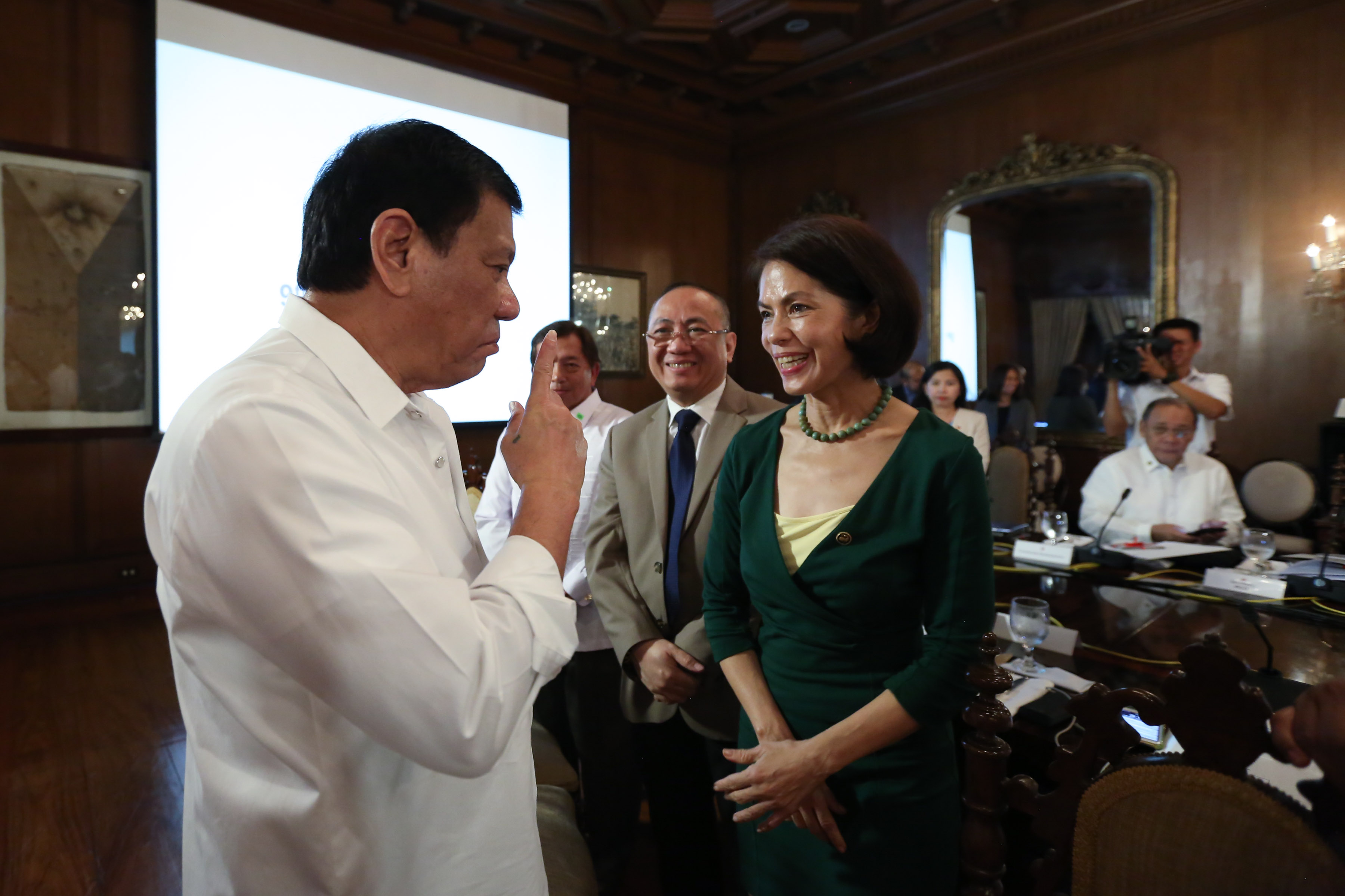 EX-ENVIRONMENT CHIEF. President Rodrigo Duterte shares a light moment with then Environment Secretary Gina Lopez at a Cabinet Meeting on December 5, 2016. File photo by King Rodriguez/ Presidential Photo  