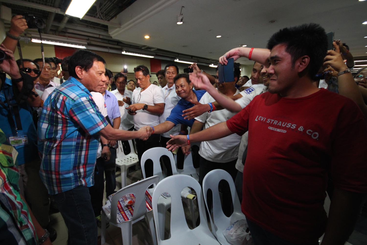 FOR PRESIDENT. Taxi drivers belonging to NAIA Transport Concessionaires Association Inc welcome Davao City Mayor Rody Duterte during Duterte's meeting with the drivers on Wednesday, June 3, 2015. Photo by Joel Leporada/Rappler  