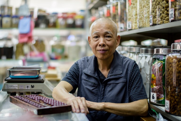 OLD HAND. In this photo taken in Hong Kong on May 10, 2017, Chinese medicine shop owner Tan Kin Hua, 72, poses in his shop. Anthony Wallace/AFP 