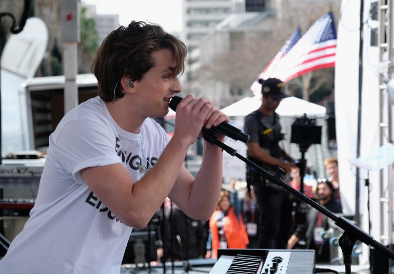 ENOUGH. Charlie Puth performs at the March for Our Lives Los Angeles rally on March 24, 2018 in Los Angeles, California.  Photo by Sarah Morris/Getty Images/AFP 