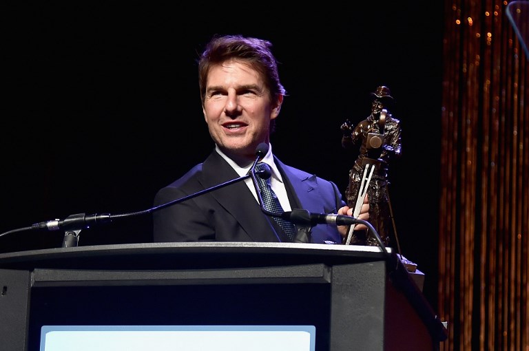 PERSISTENT. Tom Cruise is known for doing his own stunts and his ankle injury nearly delays the shooting of 'Mission Impossible'. Photo by Alberto E. Rodriguez/Getty Images for CinemaCon/AFP   
