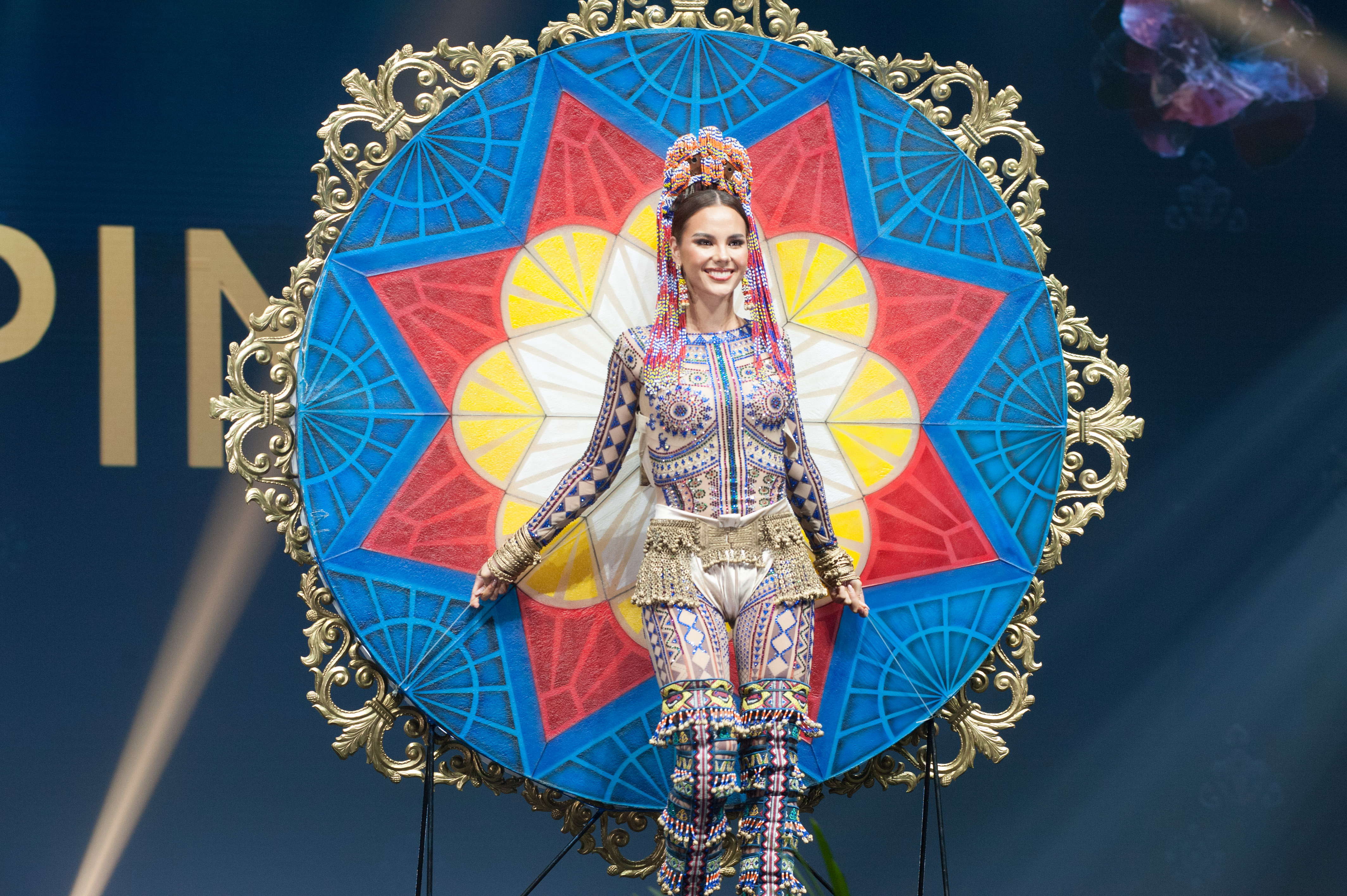 CELEBRATE. Catriona Gray shows off her costume on stage during the National Costume Show.Photo from Patrick Prather/ Miss Universe Organization   