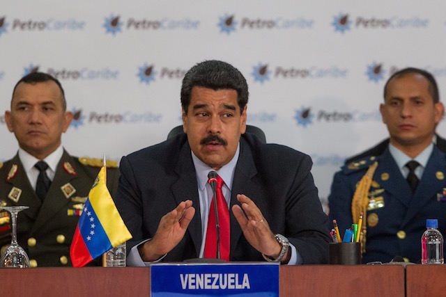 In this file photo, Venezuelan President Nicolas Maduro (C) speaks during the opening of Petrocaribe summit in Caracas, Venezuela, March 6, 2015. Miguel Gutierrez/EPA 