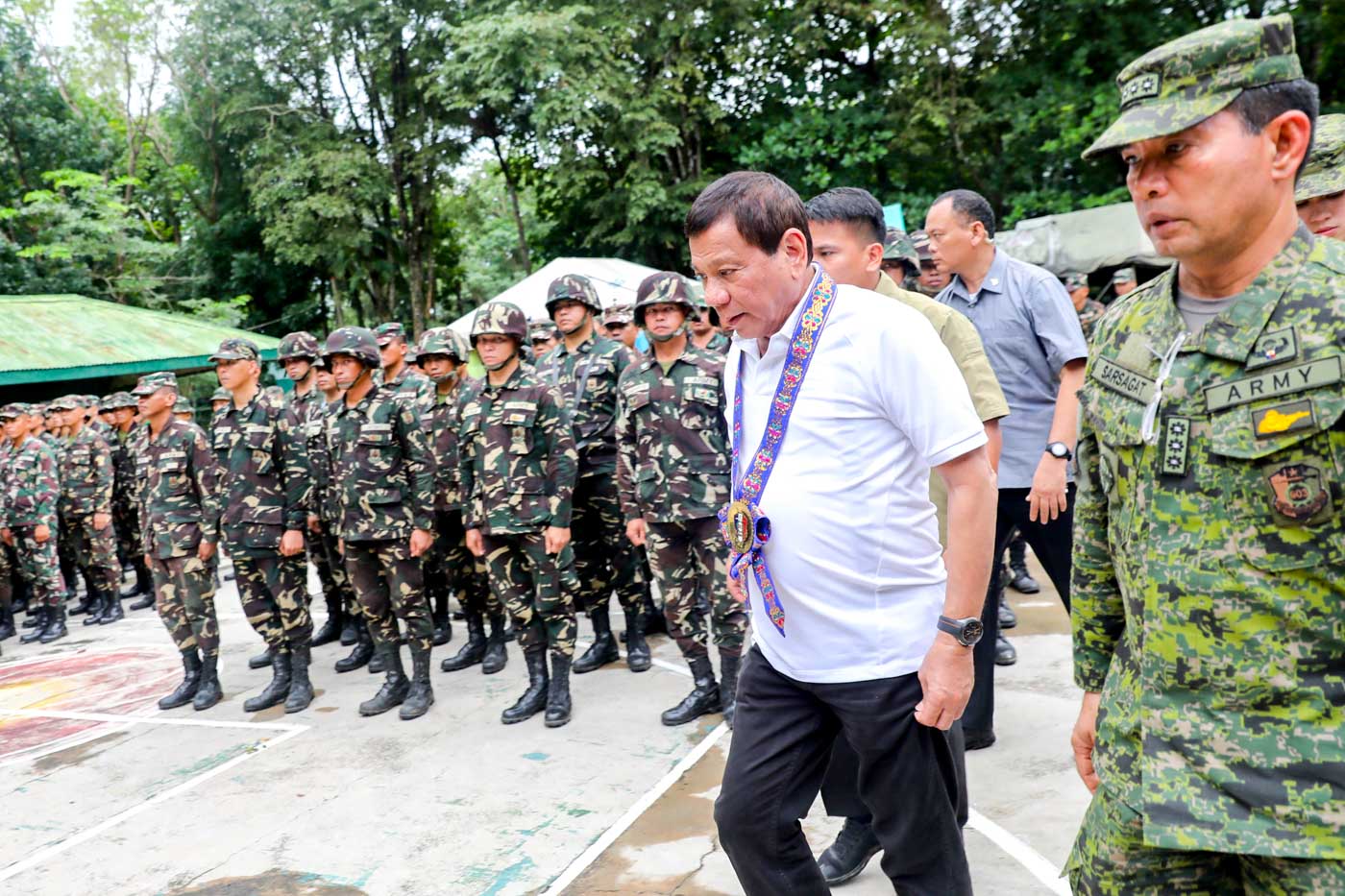 TIMES OF CONFLICT. President Rodrigo Duterte visits a Sultan Kudarat military camp days after the start of Marawi clashes. Presidential photo  