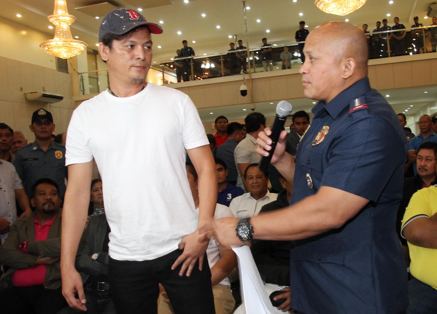 CENTRAL VISAYAS' NO. 2 DRUG LORD. Franz Sabalones surrenders to Police Director General Ronald Dela Rosa at Camp Crame on Monday. Photo by Joel Liporada/Rappler 