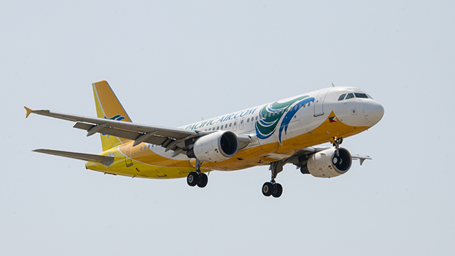 BUDGET CARRIER. A Cebu Pacific plane prepares for landing at the Ninoy Aquino International Airport. Photo from Shutterstock 