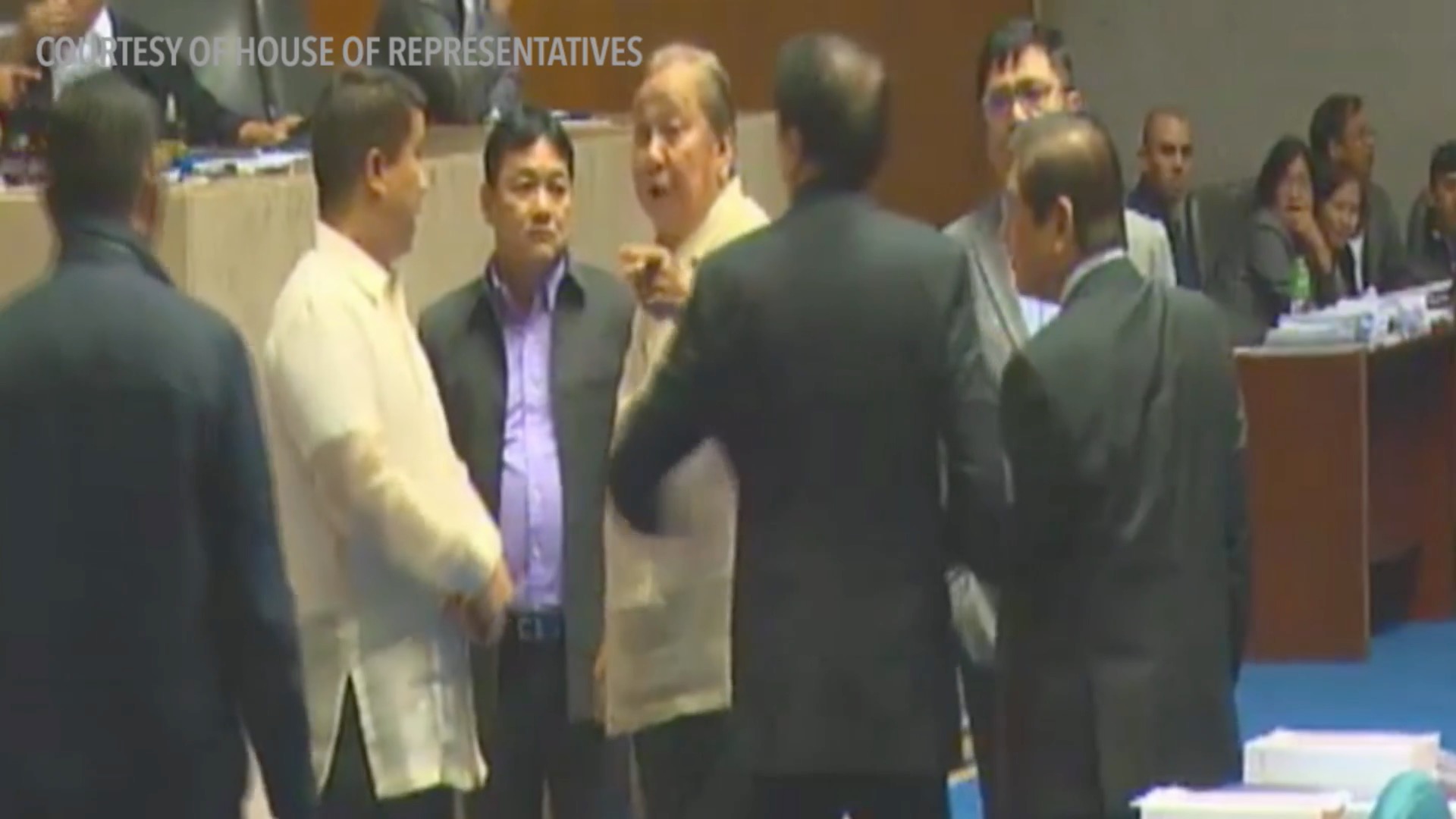 CHR BUDGET VOTE. Legislators, including minority member Representative Lito Atienza (center) deliberate after session is suspended during discussions on the CHR budget. Screengrab from the House of Representatives livestream  