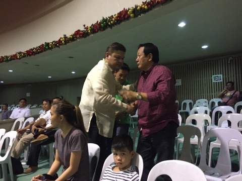 SURPRISE ANNOUNCEMENT. Presidential son Paolo Duterte, shakes hands and hugs people at the Davao City city council hall before the session, where he announces his resignation as vice mayor. Photo by Mick Basa/Rappler 