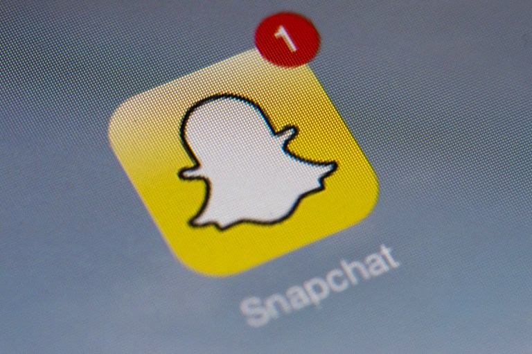 CHAT 2.0. The logo of mobile app Snapchat is displayed on a tablet in Paris on January 2, 2014. File photo by Lionel Bonaventure/AFP 