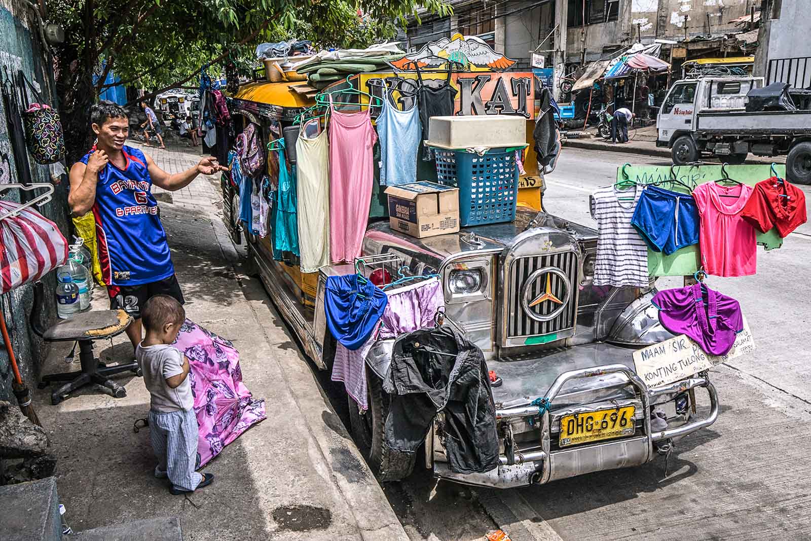 HARDEST HIT. After getting evicted from their residence in Tondo due to their failure to pay rent, jeepney driver Julius Evangelista and his family have lived inside their jeepney since the start of the Metro Manila lockdown. Photo by Darren Langit/Rappler 
