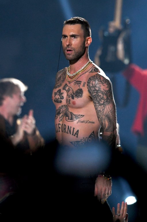 SHIRTLESS. Adam Levine of Maroon 5 goes shirtless the Pepsi Super Bowl LIII Halftime Show. Photo by Kevin Winter/Getty Images/AFP 