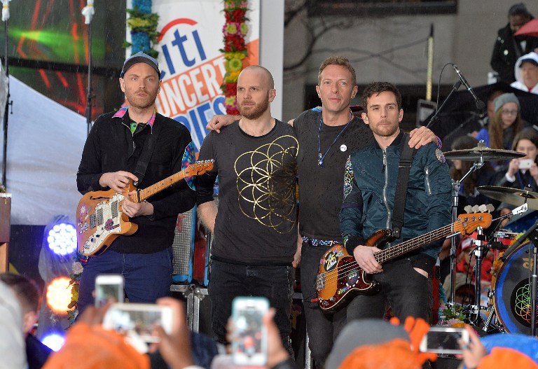 COLDPLAY IN MANILA. Photo shows guitarist Jonny Buckland, drummer Will Champion, singer Chris Martin, and bassist Guy Berryman of Coldplay perform on NBC's 'Today' at Rockefeller Plaza on March 14, 2016 in New York City. The group will perform in Manila on April 4, 2017. Photo by Slaven Vlasic/Getty Images/AFP   