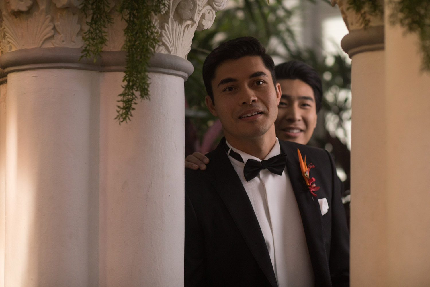 HEIR. Nick Young (Henry Golding) looks smart in a tux. Image courtesy of Warner Bros. Entertainment Inc. and RatPac-Dune Entertainment LLC 