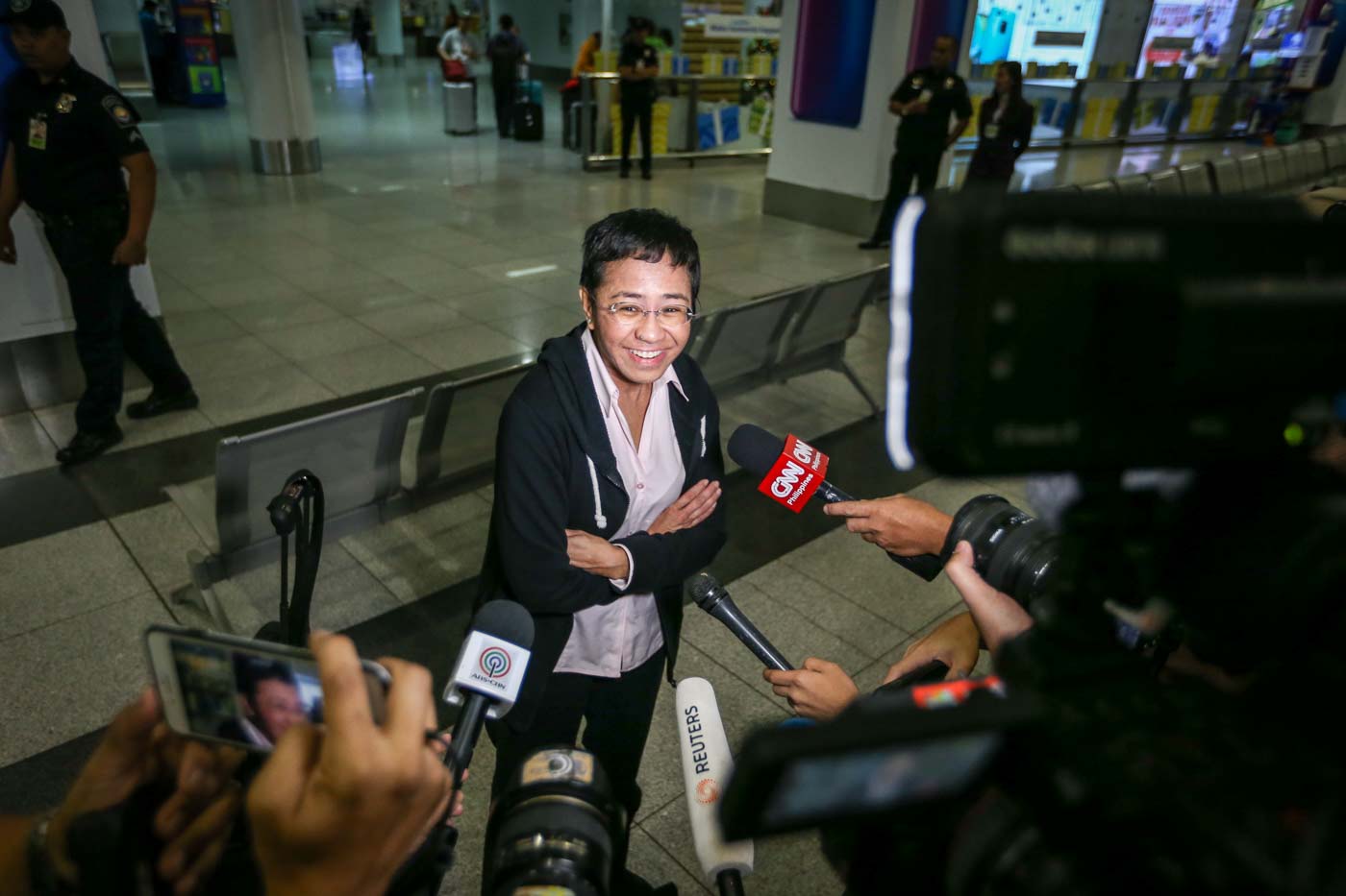 CASES. Rappler CEO Maria Ressa arrives at the NAIA Terminal 3 on December 2, 2018, a day before posting bail at the Pasig City Regional Trial Court for one of 5 tax cases filed by the Department of Justice. Photo by LeAnne Jazul/Rappler  