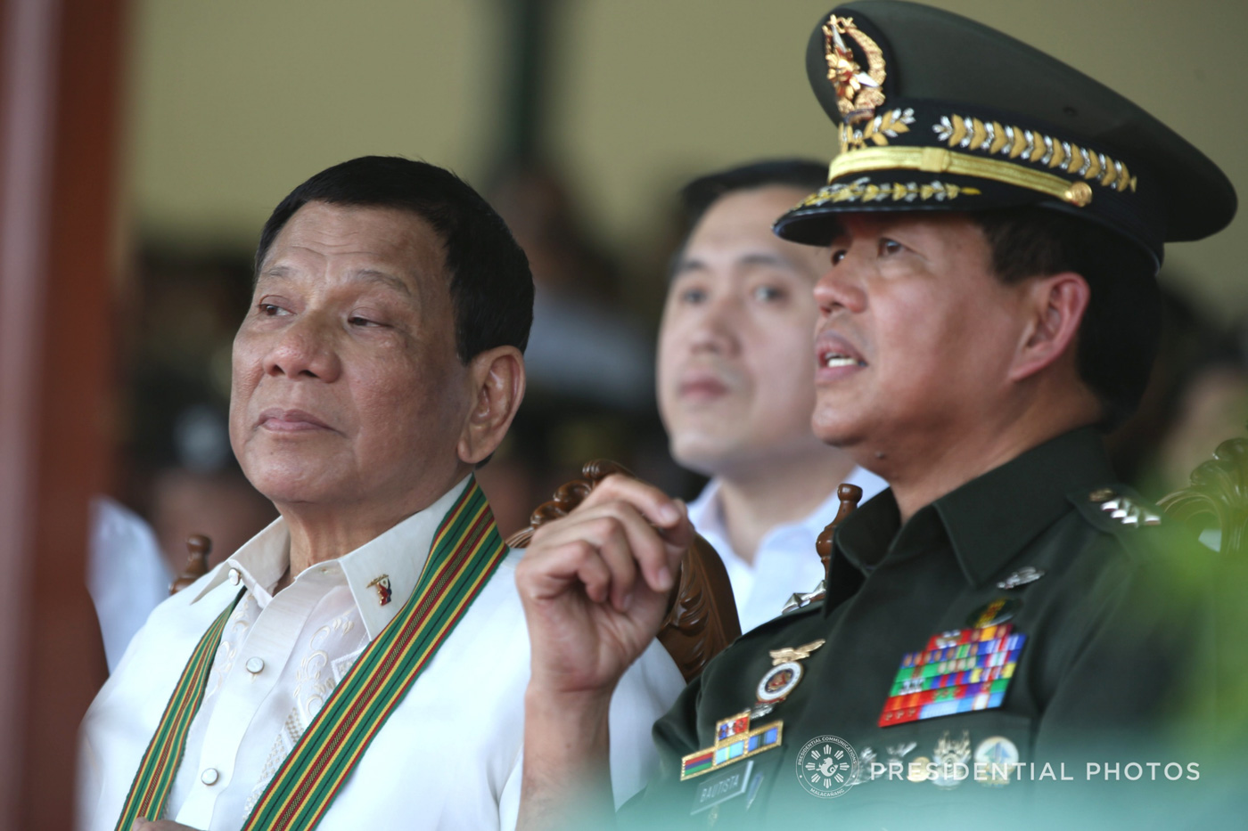 COMMANDER-IN-CHIEF. President Rodrigo Duterte chats with Army Commander Lieutenant General Rolando Bautista on the sidelines of the 121st Founding Anniversary of the Philippine Army at Fort Bonifacio, Taguig City, on March 20, 2018.  