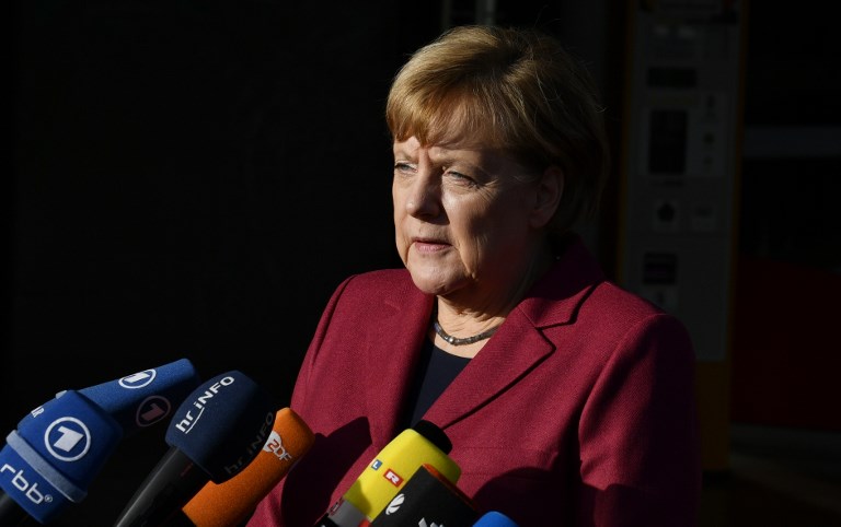 FUTURE. German Chancellor Angela Merkel speaks to journalists as she arrives at the CDU's headquarters in Berlin. File photo by John Macdougall/AFP 