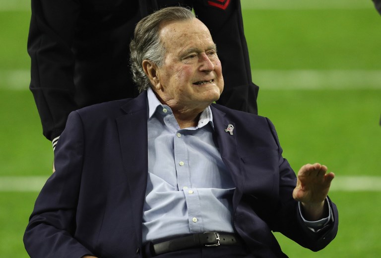 BUSH SENIOR. In this file photo, former US President George H.W. Bush arrives for the coin toss prior to Super Bowl 51 at NRG Stadium on February 5, 2017 in Houston, Texas. File photo by Patrick Smith/Getty Images/AFP  