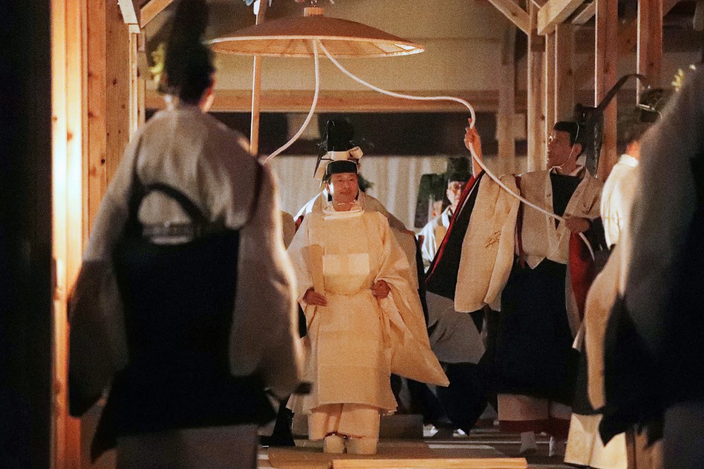 DAIJOSAI. Japan's Emperor Naruhito (C) walks towards Yukiden, one of the two main halls of Daijokyu, where Daijosai ritual of great thanksgiving takes place, at the Imperial Palace in Tokyo on November 14, 2019. Photo by STR/Japan Pool via Jiji Press/AFP 