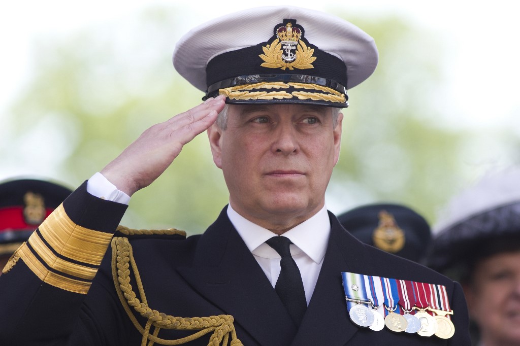 PRINCE ANDREW. In this file photo taken on June 27, 2015 Britain's Prince Andrew, Duke of York salutes military personnel during the Armed Forces day parade in Guildford. Photo by Justin Tallis/AFP 