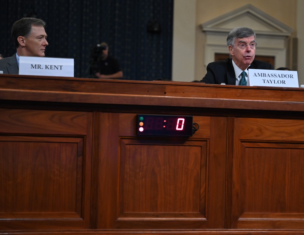WITNESSES. Ukrainian Ambassador William Taylor(R) and Deputy Assistant Secretary George Kent (L) testify during the first public hearings held by the House Permanent Select Committee on Intelligence as part of the impeachment inquiry into US President Donald Trump, on Capitol Hill in Washington, DC, November 13, 2019. Photo by Andrew Caballero-Reynolds/AFP 