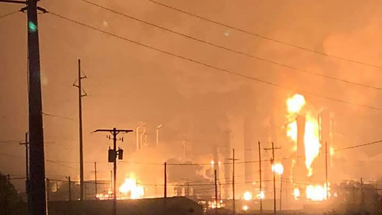 EXPLOSION. This handout image taken early on November 27, 2019 and released to AFP by Ryan Mathewson, who lives roughly two minutes from the plant with his family, shows fire and flames following an explosion at a chemical plant in the Texas city of Port Neches, east of Houston. Handout photo courtesy of Ryan Mathewson/AFP 