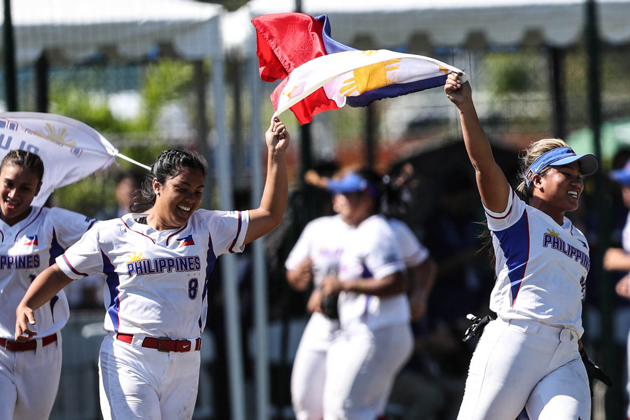 CENTURY MARK. The Philippine women's softball team adds to the golden haul on Day 8. Photo by Josh Albelda/Rappler  