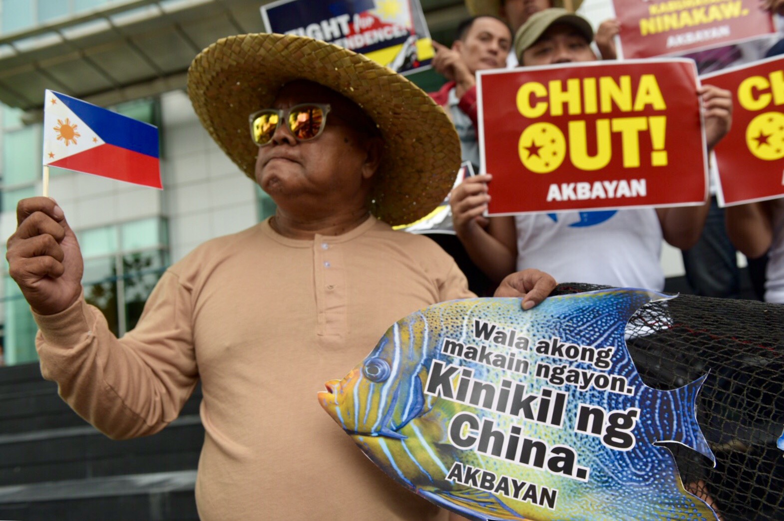'CHINA OUT!' Fisherfolk-members of activist group Akbayan troop to the Chinese consulate in Makati City on June 11, 2018, eve of Independence Day, to protest China's alleged thievery and harassment against Filipino fisherfolk Panatag Shoal (Scarborough Shoal). All photos by LeAnne Jazul/Rappler  