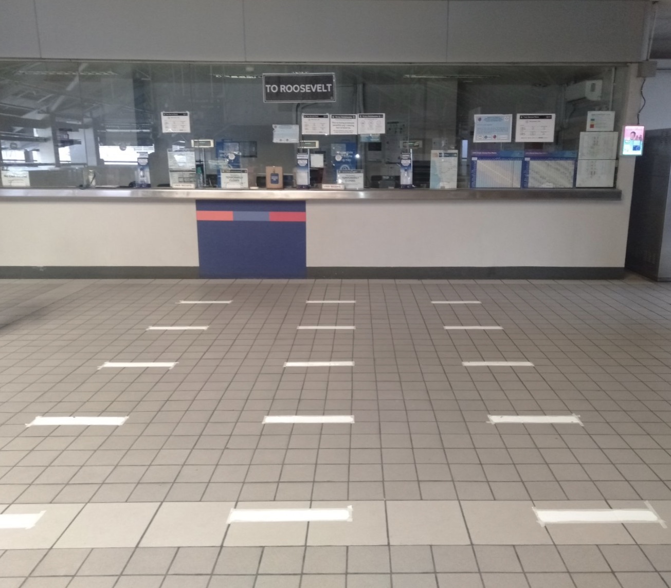 PHYSICAL DISTANCING. The area in front of the ticket booth is marked to guide passengers to observe physical distancing. Photo from LRMC 