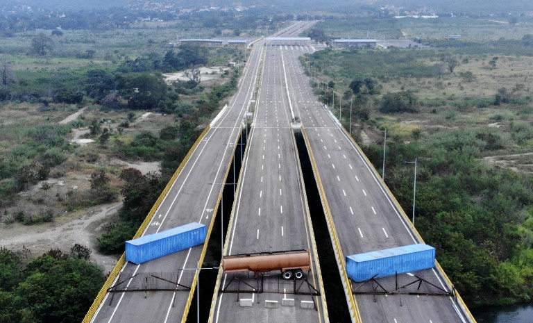 NO ENTRY. The Tienditas Bridge, in the border between Cucuta, Colombia and Tachira, Venezuela, after Venezuelan military forces blocked it with containers on February 6, 2019. Photo by Edinson Estipunan/AFP   