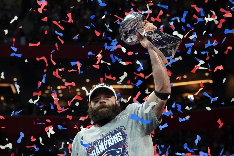 CHAMPS. Wide receiver for the New England Patriots Julian Edelman holds the trophy as he celebrates Super Bowl LIII against the Los Angeles Rams at Mercedes-Benz Stadium in Atlanta, Georgia on February 3, 2019. Photo by Timothy Clary/AFP   